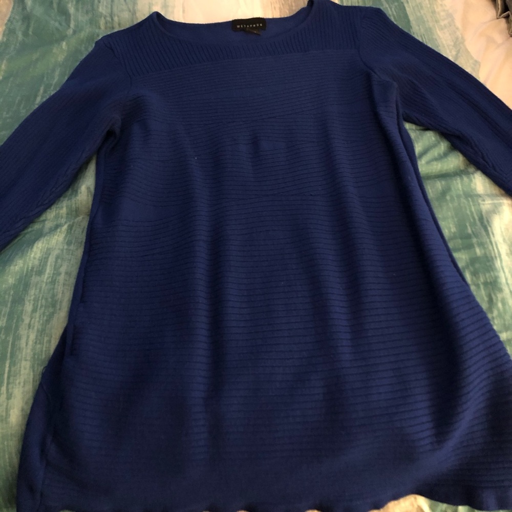 A sapphire blue sweater